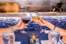 Wine toasting at Coastal Restaurant at Portofino Island Resort