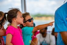 Kids on a Dolphin Cruise at Portofino Island Resort