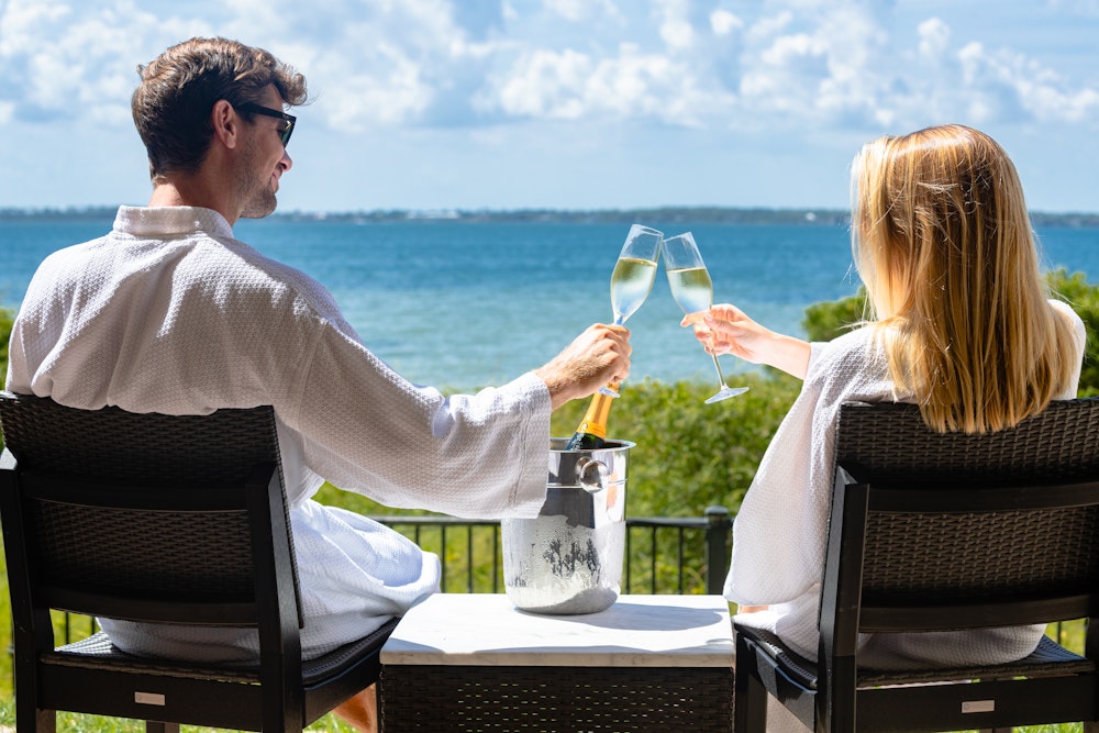 Couple toasting at Spa Portofino